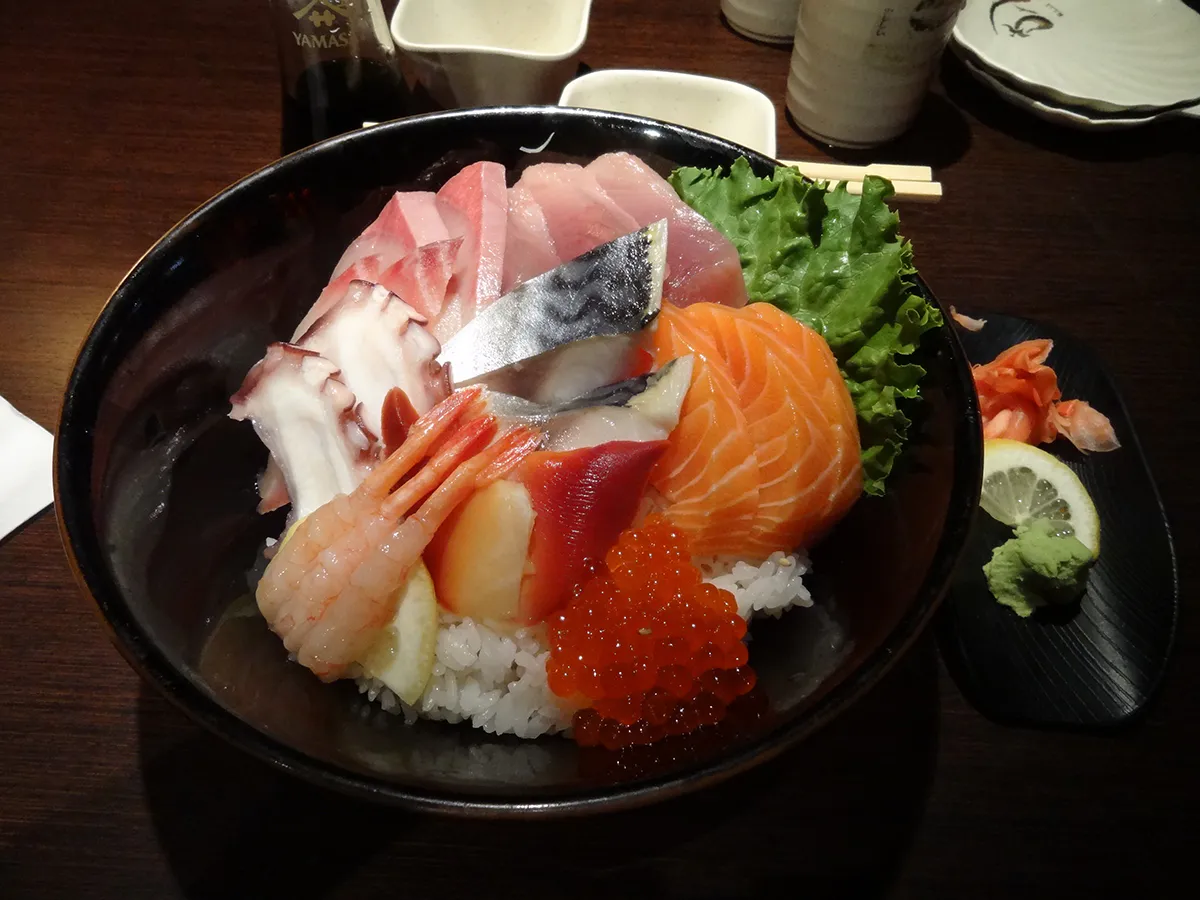 Chirashi don rice bowl loaded with assorted sashimi, shrimp, octopus and salmon roe at NIGIRI BAR JAPANESE RESTAURANT, a Japanese Restaurant in Jacksonville